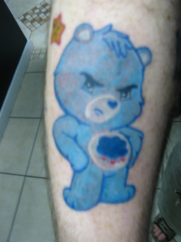 Blue Ink Teddy Bear Tattoo Design For Arm