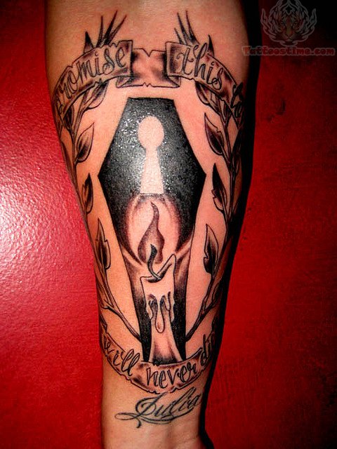 Burning Candle In Coffin With Banner Tattoo On Forearm