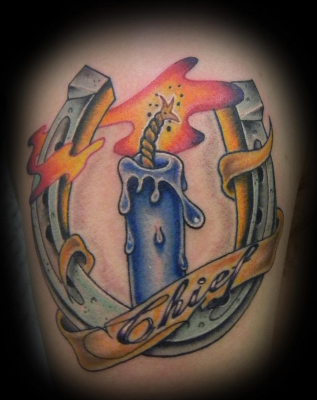 Candle In Horseshoe With Banner Tattoo Design