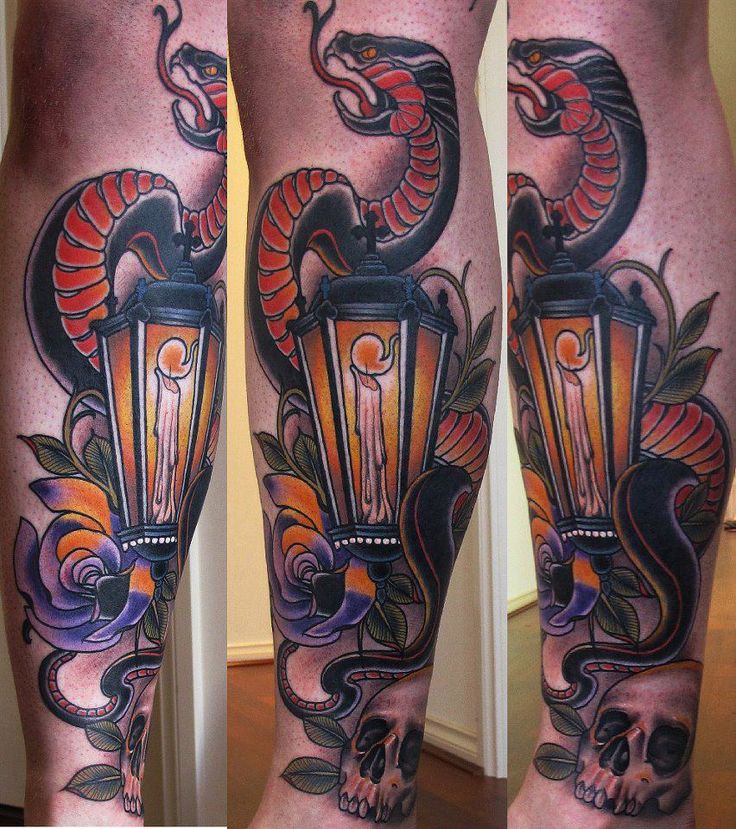 Candle Lamp With Snake And Skull Tattoo On Leg