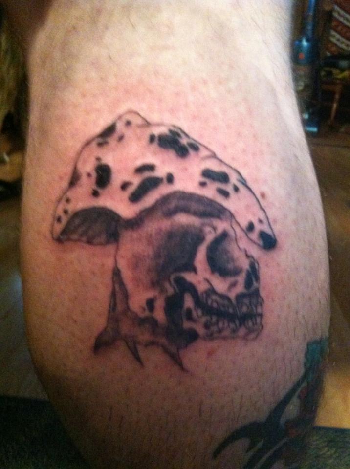 Evil Mushroom Tattoo On Back Leg