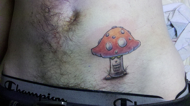 Evil Mushroom Tattoo On Hip For Men