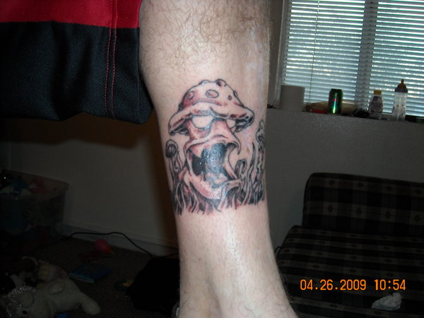 Evil Mushroom Tattoo On Leg