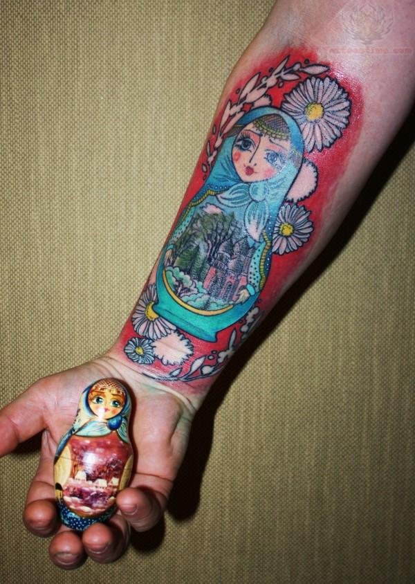 Flowers And Matryoshka Doll Tattoo On Right Forearm