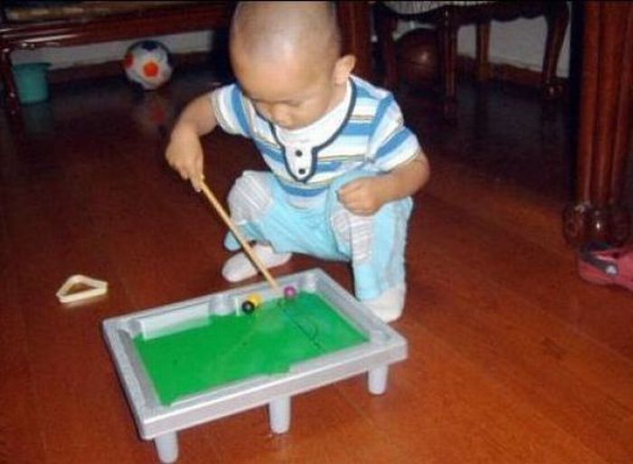 Funny Baby Playing Snooker