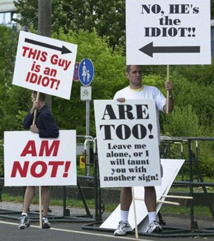 Funny Protest Sign This Guy Is An Idiot