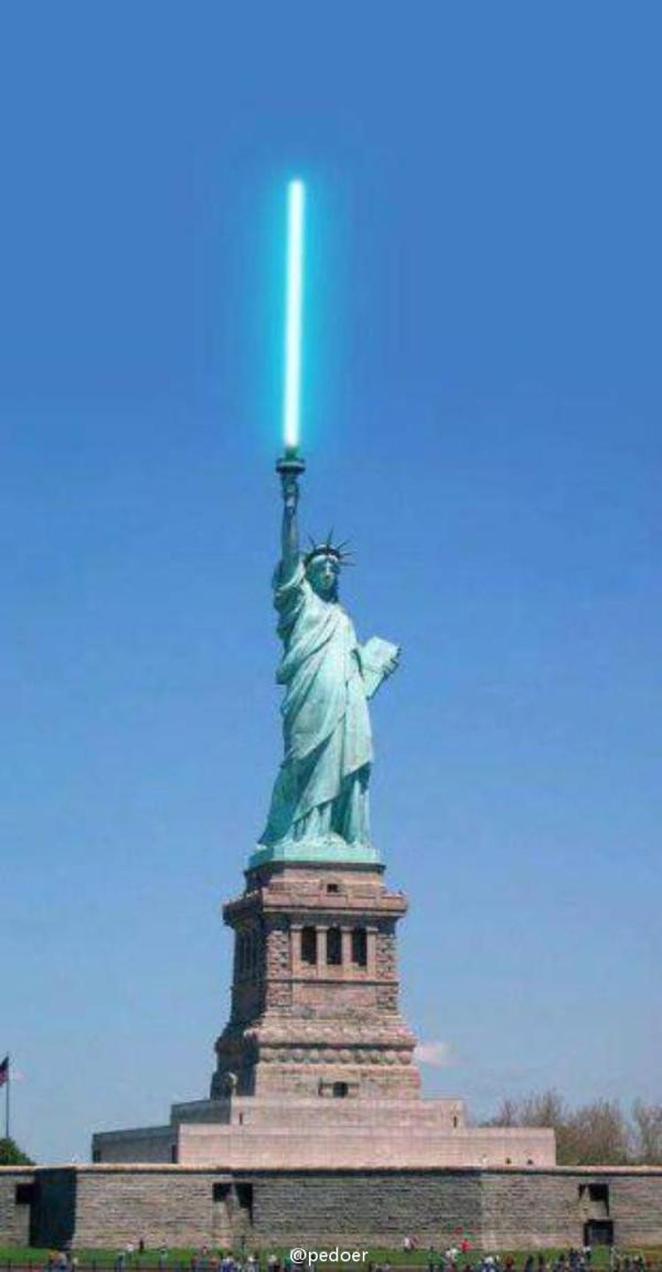 Funny Statue Of Liberty With Lightsaber