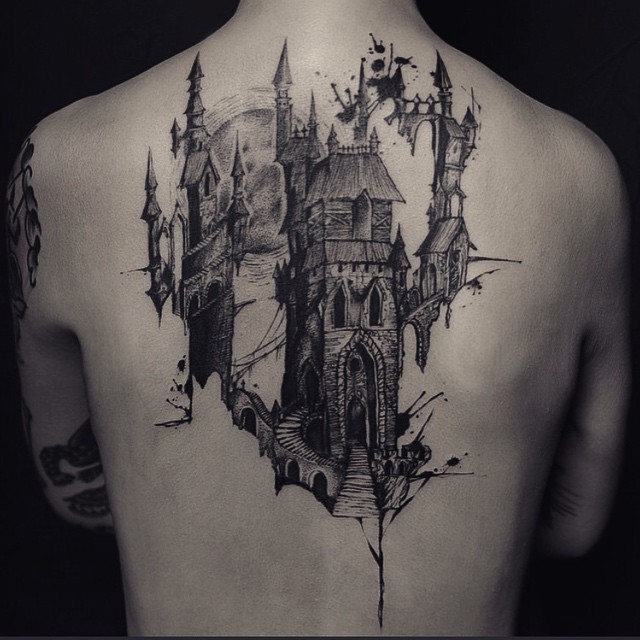 Horror Castle Tattoo On Man Upper Back