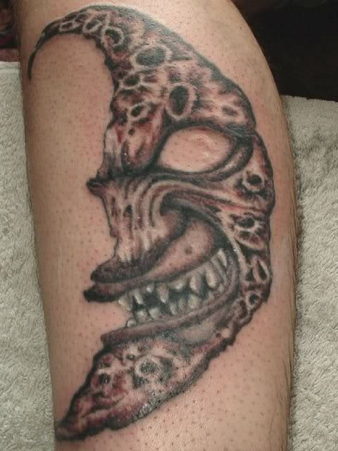Horror Half Moon Face Tattoo Design For Leg