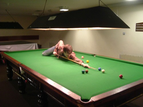 Lay Down Boy Playing Funny Snooker