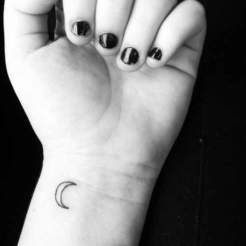 Little Black Outline Half Moon Tattoo On Girl Wrist