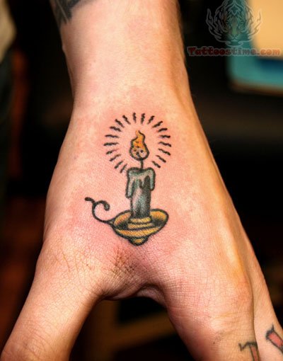 Little Candle In Holder Tattoo On Hand