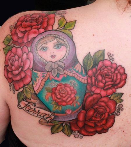 Red Flowers And Matryoshka Tattoo On Left Back Shoulder