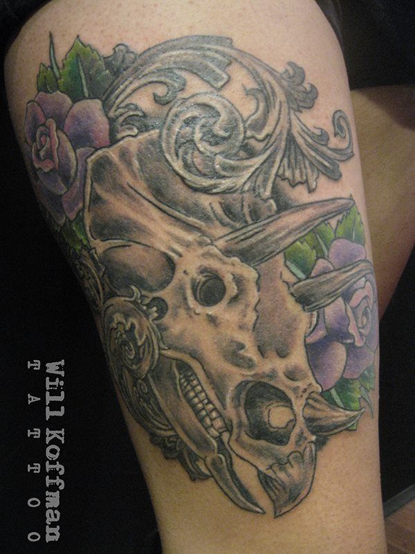 Rhino Skull With Flowers Tattoo Design For Thigh