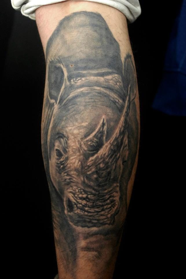 Rhino Tattoo On Leg Calf By Oscar Mora Quintero
