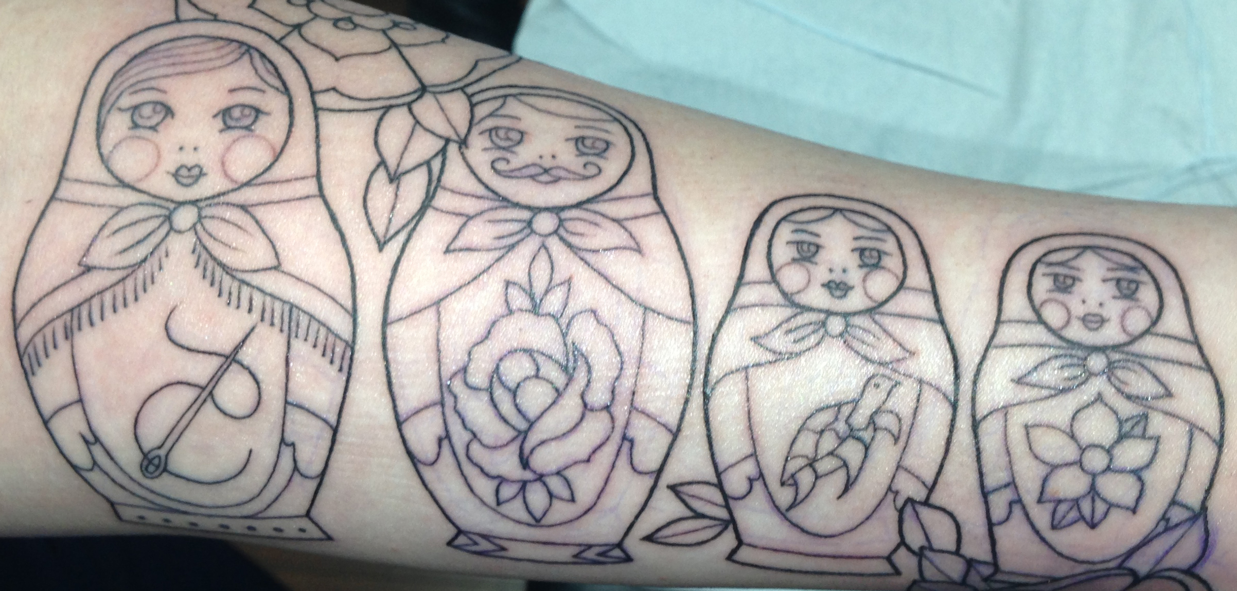 Simple Matryoshka Tattoos On Arm