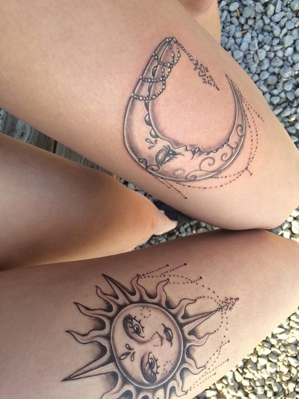 Sun And Half Moon Face Tattoo On Thigh