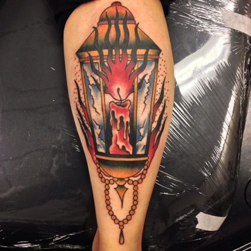 Traditional Candle Lamp Tattoo Design For Leg