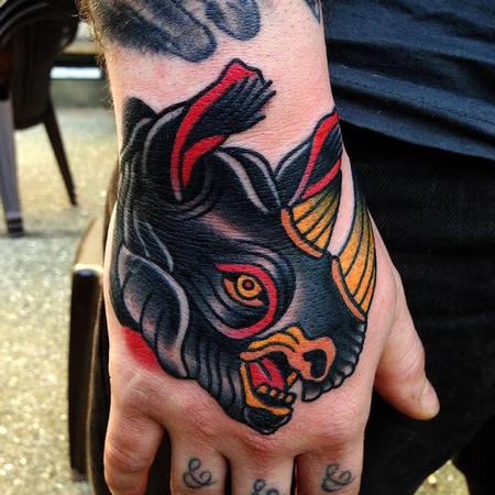 Traditional Rhino Head Tattoo On Hand