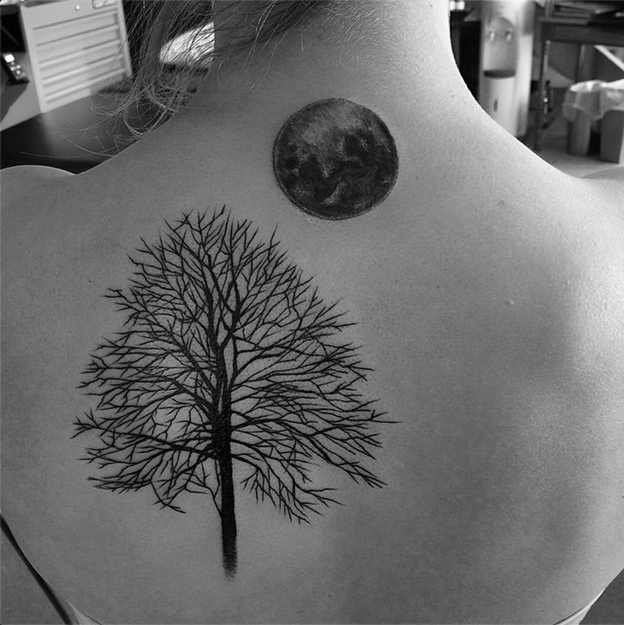 Tree Without Leaves With Moon Tattoo On Girl Upper Back
