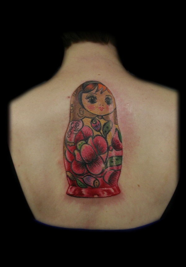 Upper Back Matryoshka Tattoo Design For Girls