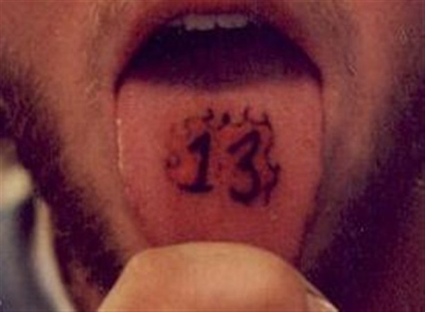 Amazing 13 Number Tattoo On Man Tongue