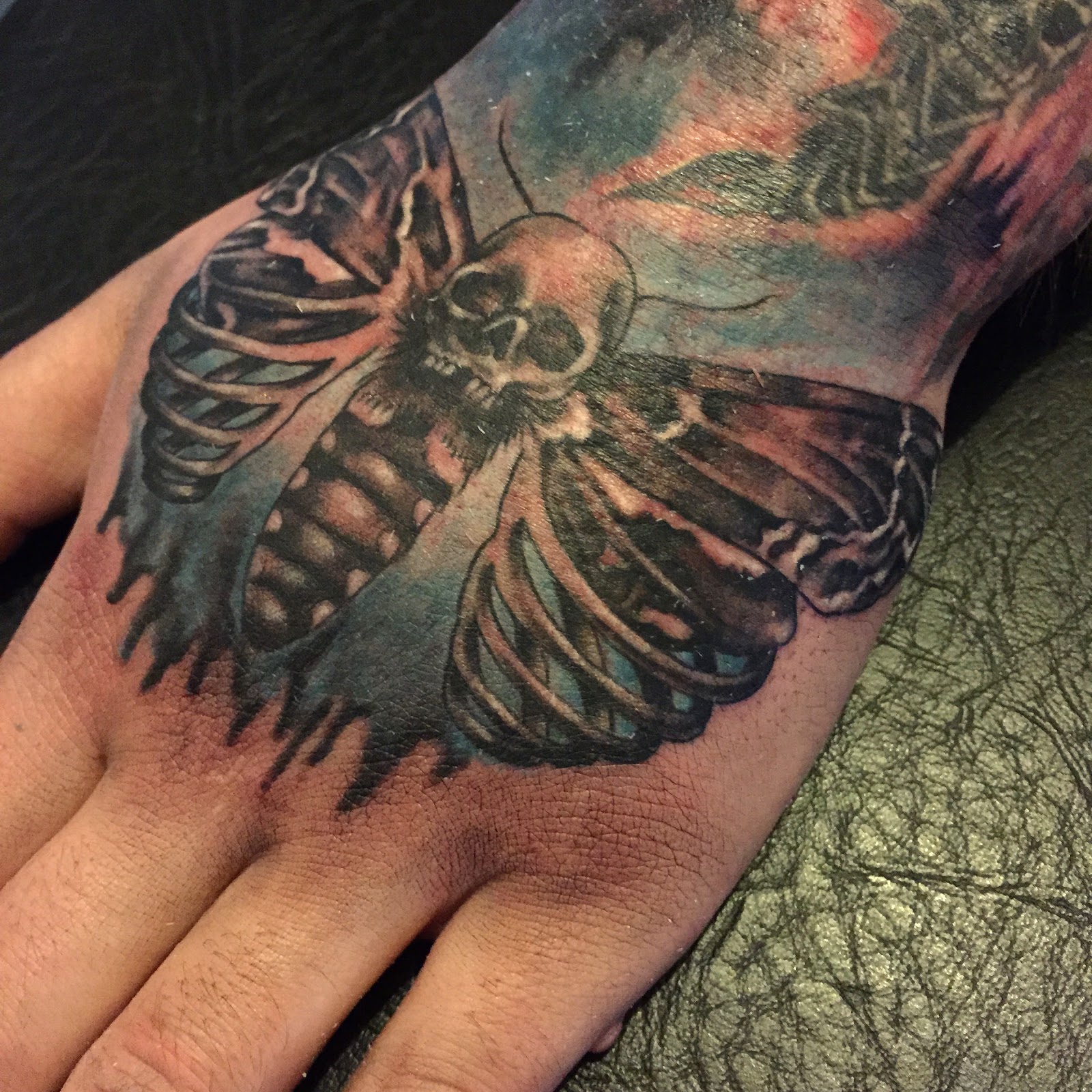 Amazing Skull Head Moth Tattoo On Hand