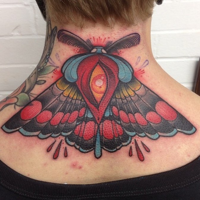 Attractive Colorful Moth Tattoo On Back Neck