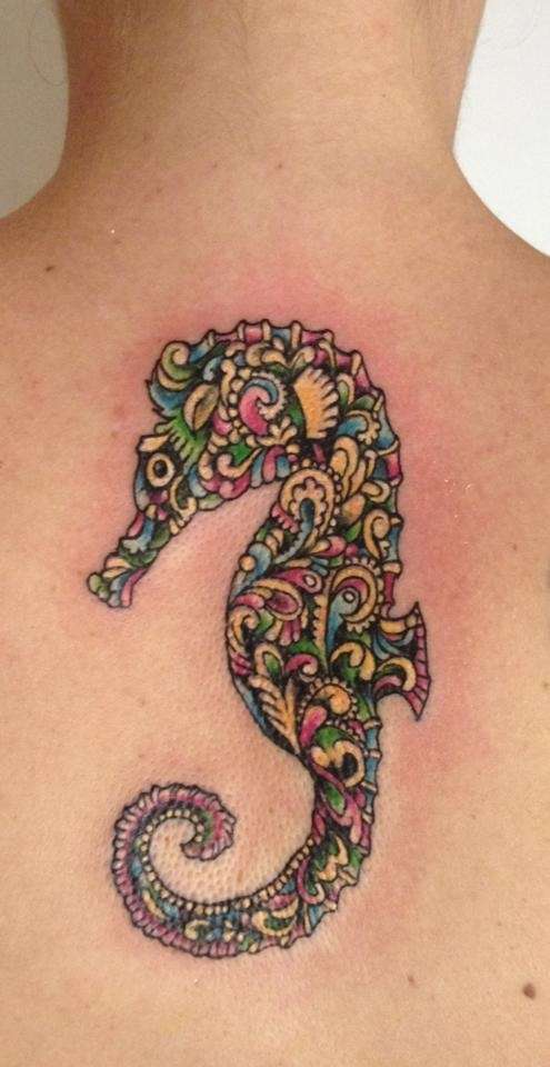Attractive Colorful Seahorse Tattoo On Upper Back
