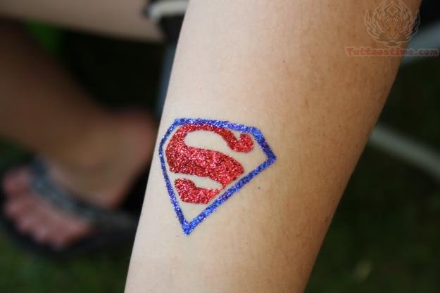 Attractive Glitter Superman Logo Tattoo Design For Arm