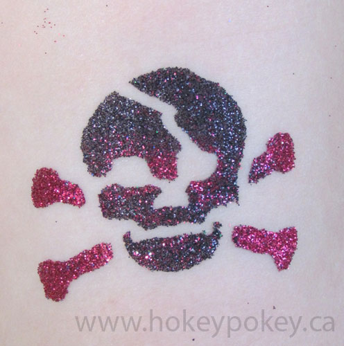 Awesome Glitter Danger Skull Tattoo Design