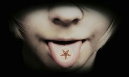 Awesome Pentagram Star Tattoo On Tongue