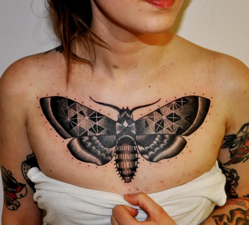 Black And Grey Moth Tattoo On Girl Collarbone