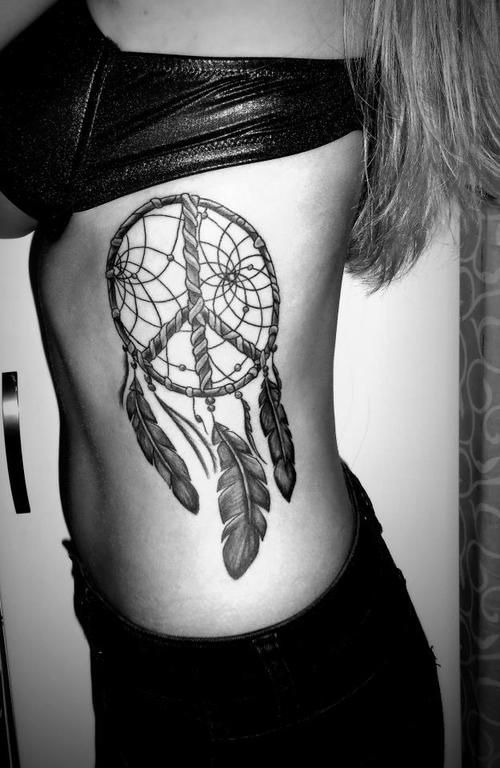 Black And Grey Peace Dreamcatcher Tattoo On Girl Side Rib
