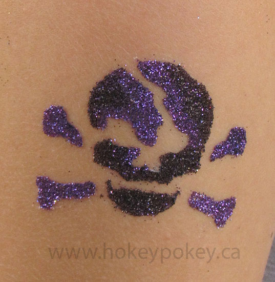Black And Purple Glitter Danger Skull Tattoo Design