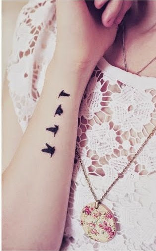 Black Flying Birds Side Wrist Tattoo For Women