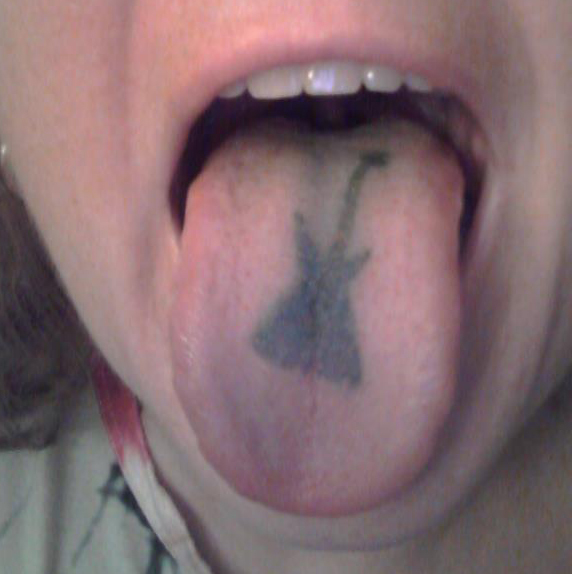 Black Guitar Tattoo On Tongue