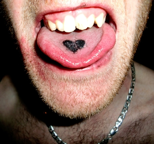 Black Heart Tattoo On Man Tongue By Phill Harley