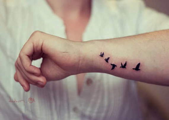 Black Ink Flying Birds Tattoo On Side Wrist