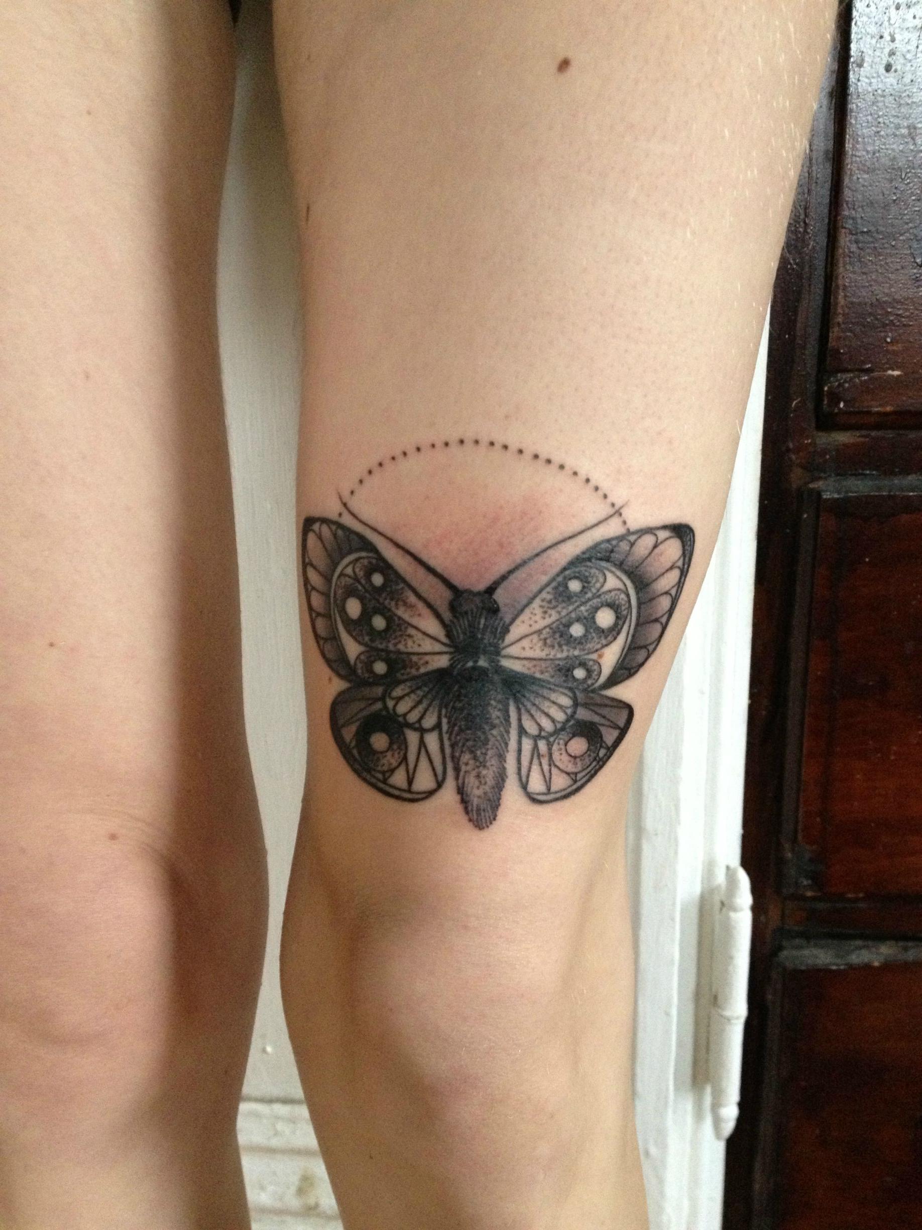 Black Ink Moth Tattoo On Thigh