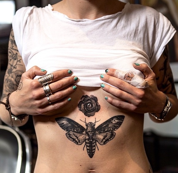Black Ink Moth With Rose Tattoo On Under Breast