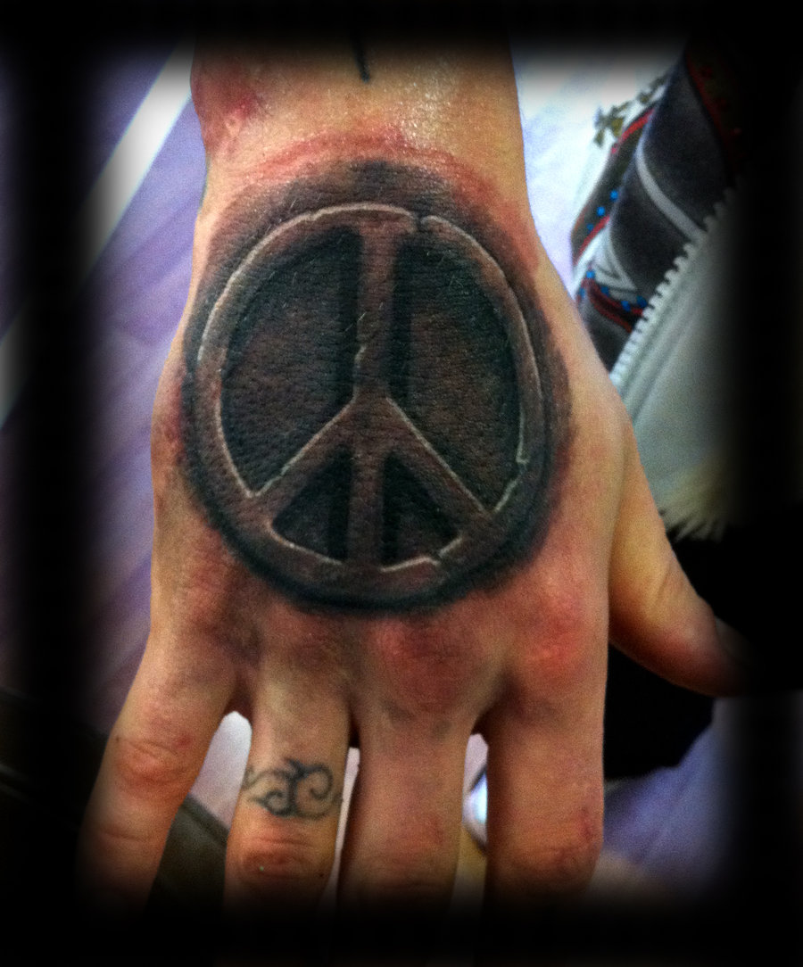 Black Ink Peace Logo Tattoo On Hand