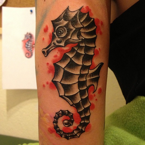 Black Ink Seahorse Tattoo Design For Arm