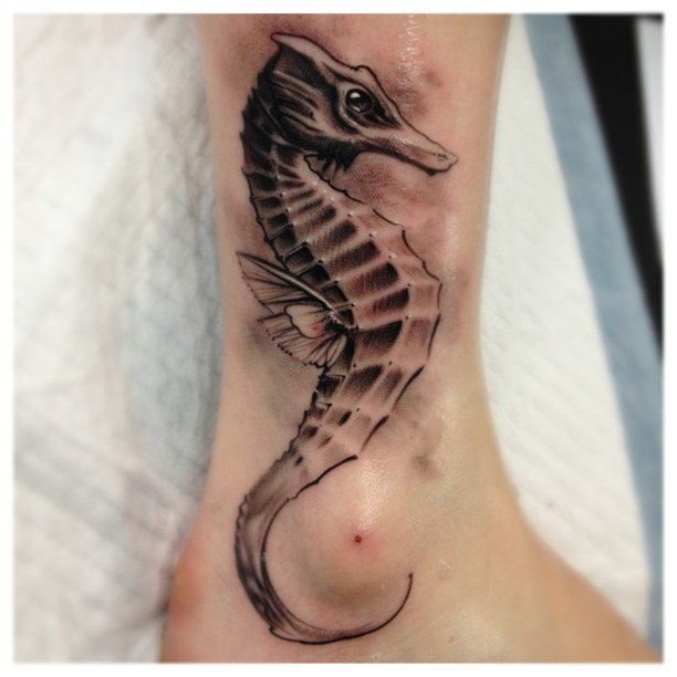 Black Ink Seahorse Tattoo On Ankle