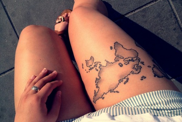 Black Ink World Map Tattoo On Thigh