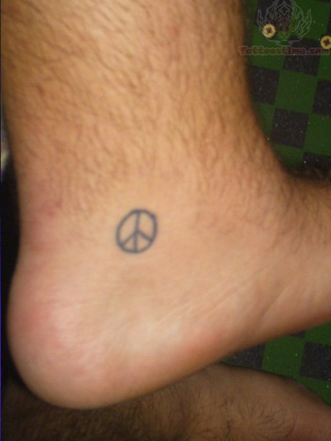 Black Little Peace Logo Tattoo On Ankle