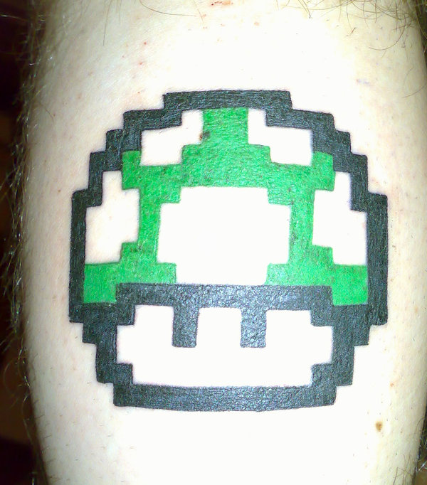 Black Outline Green Mario Mushroom Tattoo On Leg