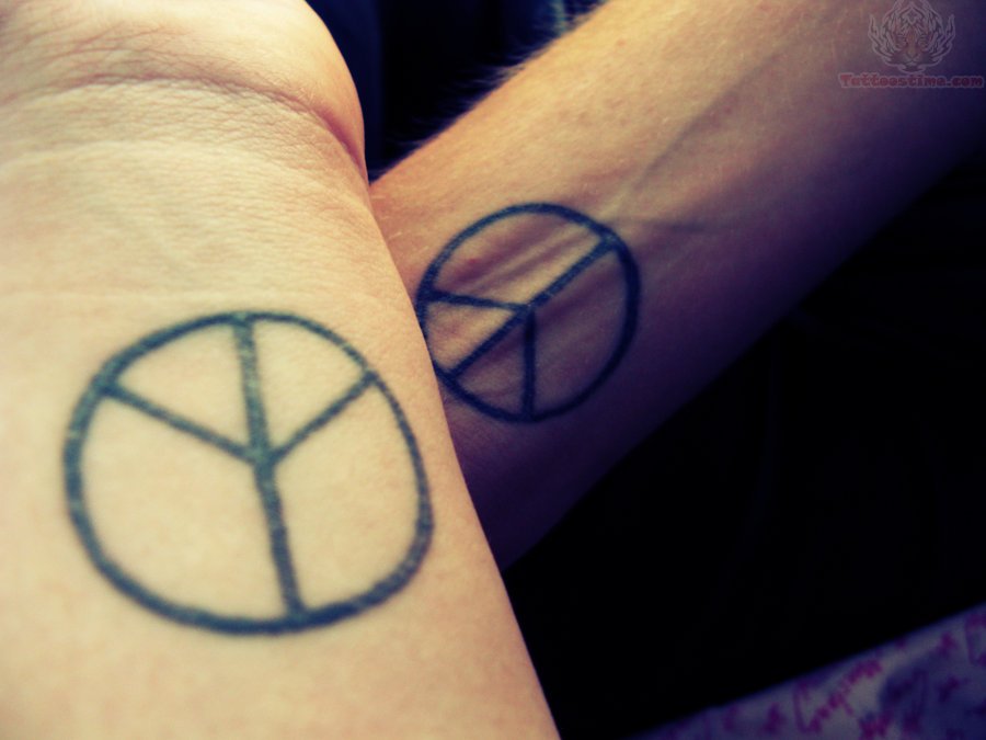 Black Peace Logo Tattoo On Couple Wrist