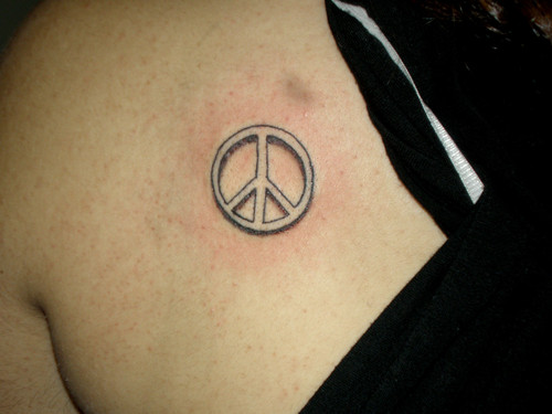 Black Peace Logo Tattoo On Left Back Shoulder