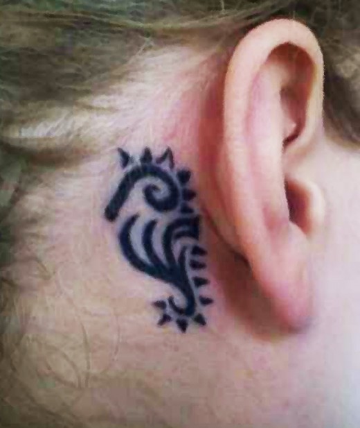 Black Tribal Seahorse Tattoo On Behind The Ear
